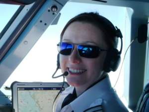 Commercial airline pilot in the flightdeck wearing Bigatmo Meso sunglasses