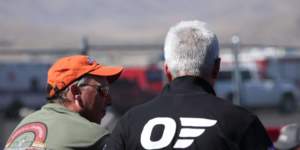 Man Wearing Bigatmo poloshirt at airrace